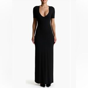 51. Naked Wardrobe $86 Short sleeve deep v-neck maxi dress in black